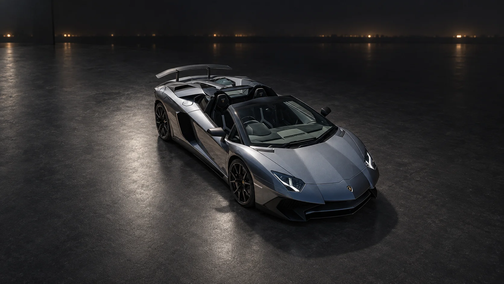 The Aventador SV Roadster at night, doors raised